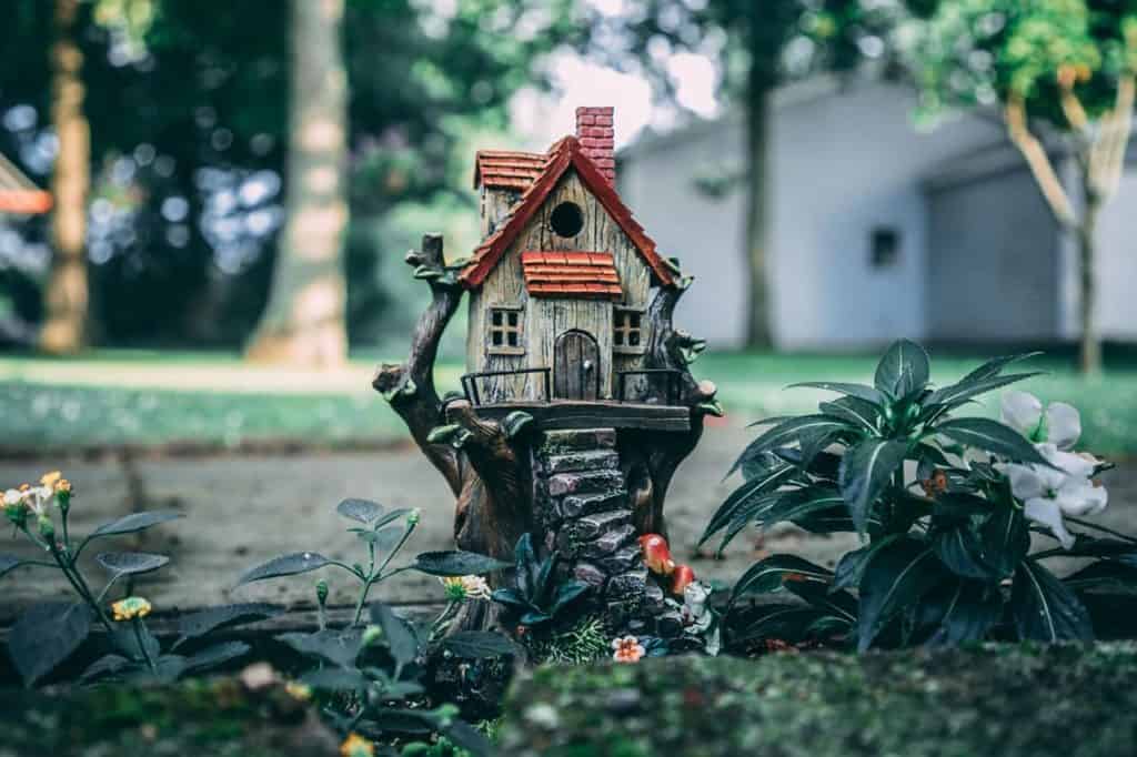 small gnome house with a red roof