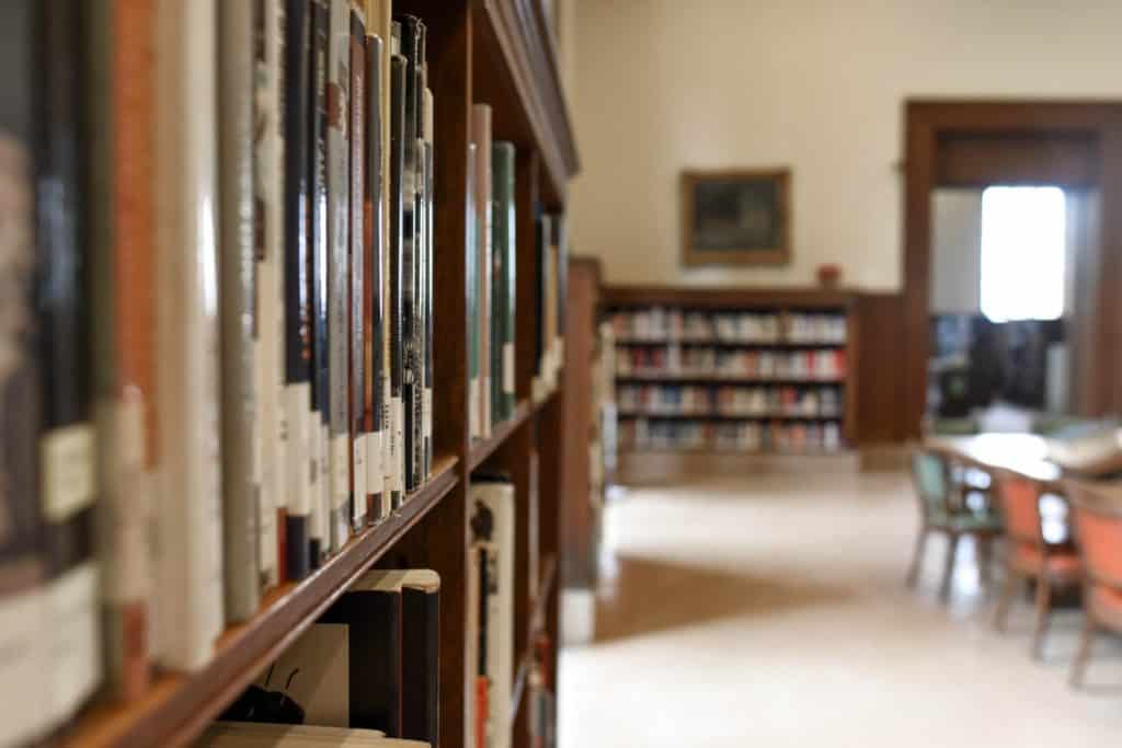 looking down a full bookshelf in a library Photo by Element5 Digital from Pexels