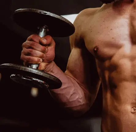 man lifting a dumbbell