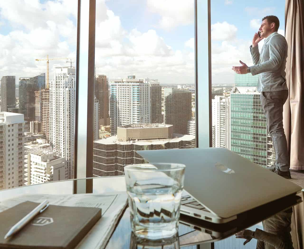 boss in suit talking on phone